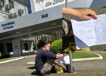 Mulher se acorrenta em frente ao Hospital São Carlos em busca de cirurgia urgente